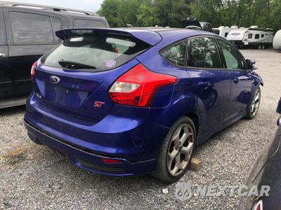 Czwarte zdjęcie samochodu z boku: 2013 FORD FOCUS ST VIN:1FADP3L97DL126987 - miniatura