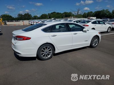 Trzecie zdjęcie samochodu z tyłu: 2017 FORD FUSION SE HYBRID VIN:3FA6P0LU1HR410084 - miniatura