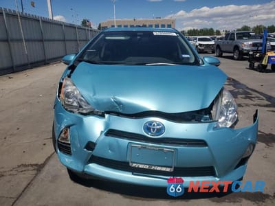 Piąte zdjęcie samochodu w środku: 2013 TOYOTA PRIUS C VIN:JTDKDTB30D1057336 - miniatura