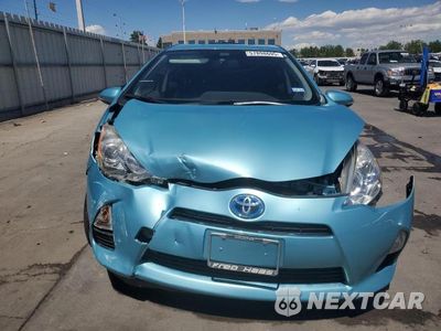 Piąte zdjęcie samochodu w środku: 2013 TOYOTA PRIUS C VIN:JTDKDTB30D1057336 - miniatura