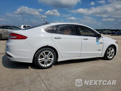 Trzecie zdjęcie samochodu z tyłu: 2018 FORD FUSION SE HYBRID VIN:3FA6P0LU2JR118644 - miniatura