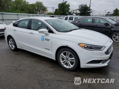 Czwarte zdjęcie samochodu z boku: 2018 FORD FUSION SE HYBRID VIN:3FA6P0LU3JR129913 - miniatura