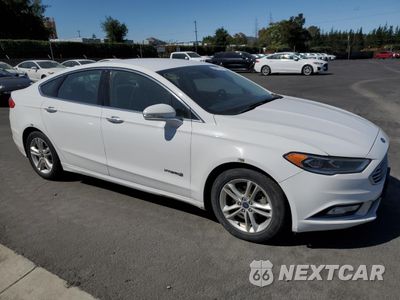 Czwarte zdjęcie samochodu z boku: 2017 FORD FUSION SE HYBRID VIN:3FA6P0LU9HR409149 - miniatura