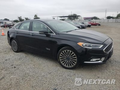 Czwarte zdjęcie samochodu z boku: 2017 FORD FUSION TITANIUM PHEV VIN:3FA6P0SU5HR105415 - miniatura