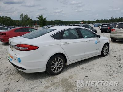 Trzecie zdjęcie samochodu z tyłu: 2017 FORD FUSION SE HYBRID VIN:3FA6P0LU9HR359689 - miniatura