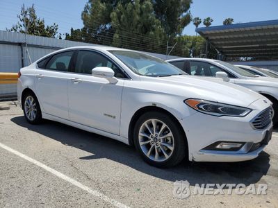 Czwarte zdjęcie samochodu z boku: 2017 FORD FUSION SE HYBRID VIN:3FA6P0LU9HR409684 - miniatura