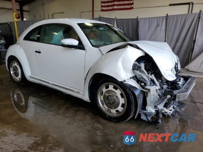 Czwarte zdjęcie samochodu z boku: 2015 VOLKSWAGEN BEETLE 1.8T VIN:3VWF17ATXFM603467 - miniatura