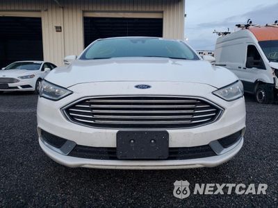 Piąte zdjęcie samochodu w środku: 2018 FORD FUSION SE HYBRID VIN:3FA6P0LU6JR171735 - miniatura