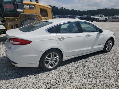 Trzecie zdjęcie samochodu z tyłu: 2018 FORD FUSION SE HYBRID VIN:3FA6P0LU8JR118793 - miniatura