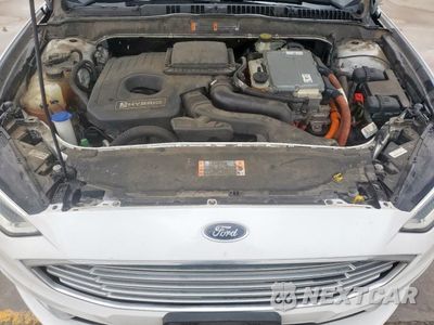 Zdjęcie 11 z 13 samochodu: 2018 FORD FUSION SE HYBRID VIN:3FA6P0LU7JR118655 - miniatura