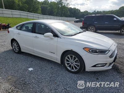 Czwarte zdjęcie samochodu z boku: 2017 FORD FUSION SE HYBRID VIN:3FA6P0LU7HR359674 - miniatura