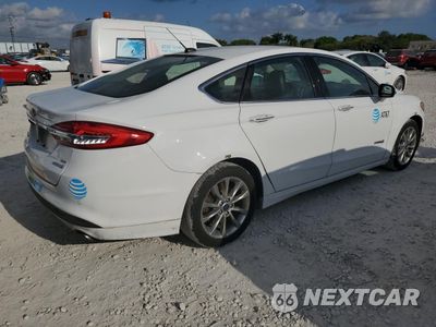 Trzecie zdjęcie samochodu z tyłu: 2017 FORD FUSION SE HYBRID VIN:3FA6P0LU5HR409472 - miniatura