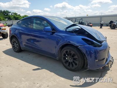 Czwarte zdjęcie samochodu z boku: 2023 TESLA MODEL Y VIN:7SAYGDEE7PA171396 - miniatura