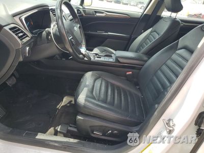 Zdjęcie 7 z 12 samochodu: 2017 FORD FUSION SE HYBRID VIN:3FA6P0LUXHR410049 - miniatura