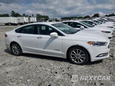 Czwarte zdjęcie samochodu z boku: 2017 FORD FUSION SE HYBRID VIN:3FA6P0LU8HR409613 - miniatura