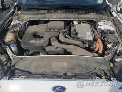 Zdjęcie 11 z 12 samochodu: 2018 FORD FUSION SE HYBRID VIN:3FA6P0LU3JR171854 - miniatura