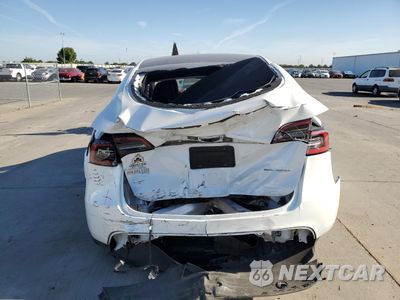 Zdjęcie 6 z 12 samochodu: 2023 TESLA MODEL Y VIN:7SAYGDEE0PA166816 - miniatura