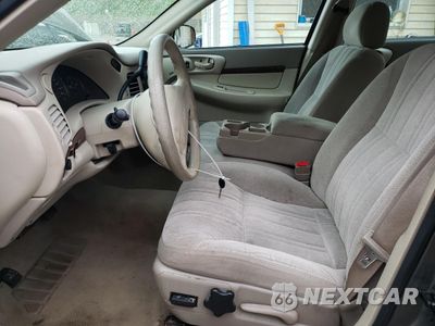 Zdjęcie 7 z 14 samochodu: 2003 CHEVROLET IMPALA VIN:2G1WF52E239246517 - miniatura