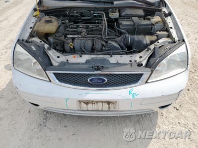 Zdjęcie 11 z 12 samochodu: 2006 FORD FOCUS ZX4 VIN:1FAHP34NX6W254946 - miniatura