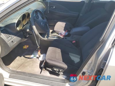 Zdjęcie 7 z 12 samochodu: 2003 NISSAN ALTIMA BASE VIN:1N4AL11E13C242591 - miniatura