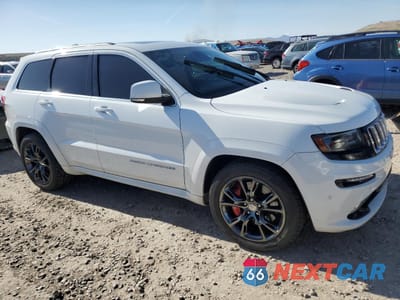 Czwarte zdjęcie samochodu z boku: 2014 JEEP GRAND CHEROKEE SRT-8 VIN:1C4RJFDJ0EC226720 - miniatura