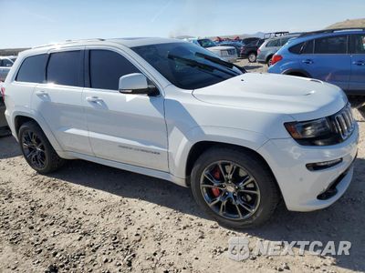 Czwarte zdjęcie samochodu z boku: 2014 JEEP GRAND CHEROKEE SRT-8 VIN:1C4RJFDJ0EC226720 - miniatura
