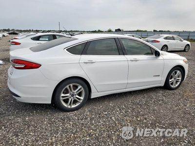 Trzecie zdjęcie samochodu z tyłu: 2018 FORD FUSION SE HYBRID VIN:3FA6P0LU5JR129816 - miniatura