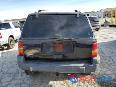 Zdjęcie 6 z 13 samochodu: 1997 JEEP GRAND CHEROKEE LAREDO VIN:1J4GZ58S1VC707714 - miniatura