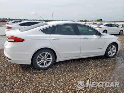 Trzecie zdjęcie samochodu z tyłu: 2018 FORD FUSION SE HYBRID VIN:3FA6P0LU7JR163546 - miniatura