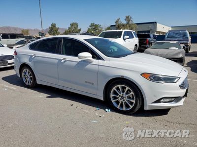 Czwarte zdjęcie samochodu z boku: 2017 FORD FUSION SE HYBRID VIN:3FA6P0LU3HR409051 - miniatura