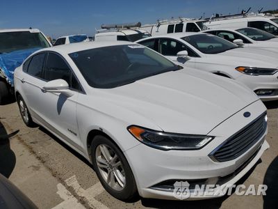 Czwarte zdjęcie samochodu z boku: 2018 FORD FUSION SE HYBRID VIN:3FA6P0LU6JR278624 - miniatura