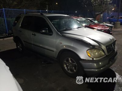 Czwarte zdjęcie samochodu z boku: 1998 MERCEDES-BENZ ML 320 VIN:4JGAB54E5WA043295 - miniatura
