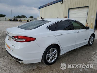 Trzecie zdjęcie samochodu z tyłu: 2018 FORD FUSION SE HYBRID VIN:3FA6P0LUXJR129858 - miniatura