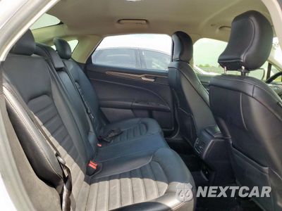 Zdjęcie 10 z 12 samochodu: 2017 FORD FUSION SE HYBRID VIN:3FA6P0LUXHR409001 - miniatura