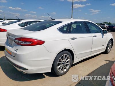 Trzecie zdjęcie samochodu z tyłu: 2017 FORD FUSION SE HYBRID VIN:3FA6P0LU7HR409411 - miniatura