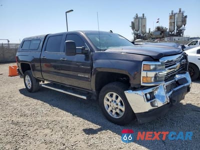 Czwarte zdjęcie samochodu z boku: 2015 CHEVROLET SILVERADO K2500 HEAVY DUTY LT VIN:1GC1KVE84FF116589 - miniatura