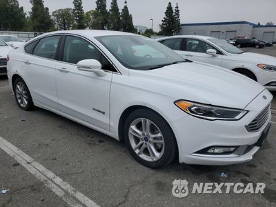 Czwarte zdjęcie samochodu z boku: 2017 FORD FUSION SE HYBRID VIN:3FA6P0LU6HR409318 - miniatura