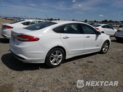Trzecie zdjęcie samochodu z tyłu: 2018 FORD FUSION SE HYBRID VIN:3FA6P0LU9JR129835 - miniatura