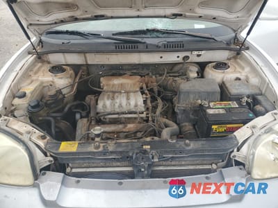 Zdjęcie 12 z 15 samochodu: 2002 HYUNDAI SANTA FE GLS VIN:KM8SC13D92U292632 - miniatura