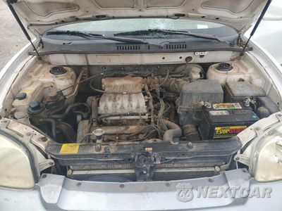 Zdjęcie 12 z 15 samochodu: 2002 HYUNDAI SANTA FE GLS VIN:KM8SC13D92U292632 - miniatura