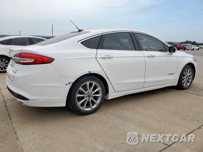 Trzecie zdjęcie samochodu z tyłu: 2017 FORD FUSION SE HYBRID VIN:3FA6P0LU6HR409447 - miniatura