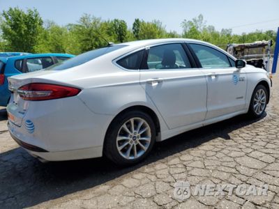 Trzecie zdjęcie samochodu z tyłu: 2017 FORD FUSION SE HYBRID VIN:3FA6P0LU5HR409715 - miniatura