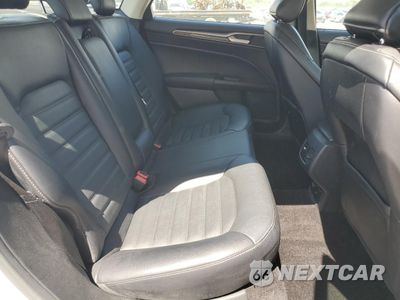 Zdjęcie 10 z 12 samochodu: 2017 FORD FUSION SE HYBRID VIN:3FA6P0LU5HR359625 - miniatura