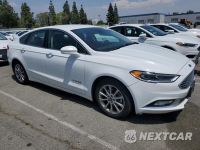 Czwarte zdjęcie samochodu z boku: 2017 FORD FUSION SE HYBRID VIN:3FA6P0LU8HR408946 - miniatura