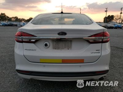 Zdjęcie 6 z 12 samochodu: 2017 FORD FUSION SE HYBRID VIN:3FA6P0LU5HR359687 - miniatura