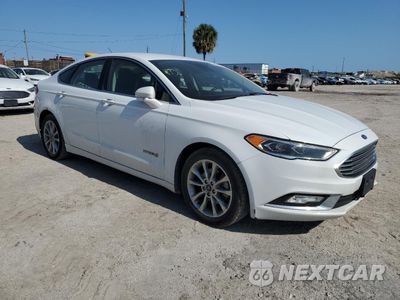 Czwarte zdjęcie samochodu z boku: 2017 FORD FUSION SE HYBRID VIN:3FA6P0LU1HR409467 - miniatura