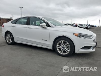 Czwarte zdjęcie samochodu z boku: 2018 FORD FUSION SE HYBRID VIN:3FA6P0LU7JR278728 - miniatura