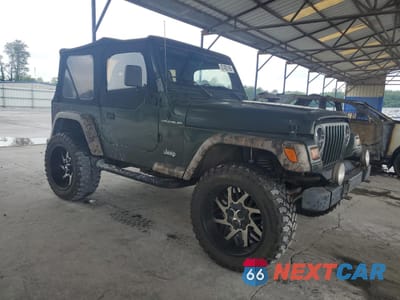 Czwarte zdjęcie samochodu z boku: 1997 JEEP WRANGLER / TJ SE VIN:1J4FY29P4VP457563 - miniatura