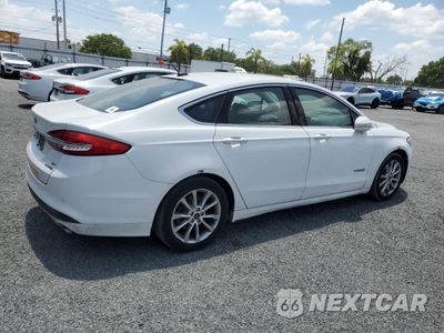 Trzecie zdjęcie samochodu z tyłu: 2017 FORD FUSION SE HYBRID VIN:3FA6P0LU9HR359546 - miniatura
