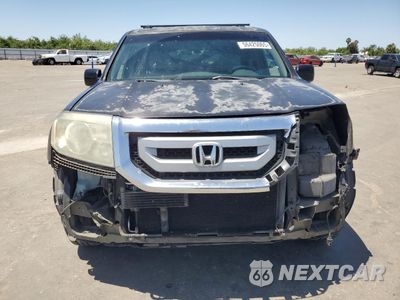 Piąte zdjęcie samochodu w środku: 2011 HONDA PILOT EX VIN:5FNYF4H49BB087109 - miniatura
